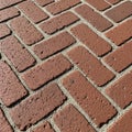 Of a brick pavement showing red rectangular bricks laid in a Royalty Free Stock Photo