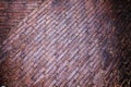 Brick paving background, an old red and brown brick street, pavement floor. Royalty Free Stock Photo