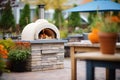 brick pizza oven on a stone patio Royalty Free Stock Photo