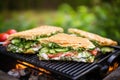 brick-pressed packed sandwich on bbq grill