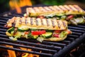 brick-pressed vegetable sandwich on grill