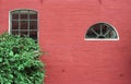 Brick red wall and green windows texture pattern seamless retro vintage Royalty Free Stock Photo