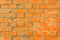 Brick red wall texture. Background of a new brick house with cement Royalty Free Stock Photo