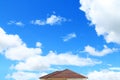 Brick roof with clear cloud blue sky Royalty Free Stock Photo