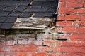 Brick and roof disintegration in building