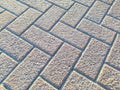 A brick sidewalk with a checkered pattern Royalty Free Stock Photo