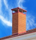 brick smokestack on background sky Royalty Free Stock Photo