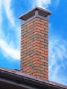 Brick smokestack isolated on background of sky Royalty Free Stock Photo