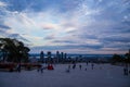 Brick stone paved Mount Royal Park with the Montreal skyline view at dusk