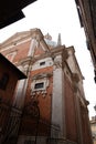 Brick and stone walled small church and street view from the historical Italian city of Siena, Italy Royalty Free Stock Photo