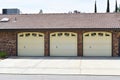 Brick and tile modern three car garage