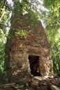 Brick tower in the forest