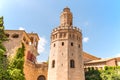 Brick tower on sky blue background