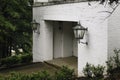 Brick tunnel entrance with vintage lanterns