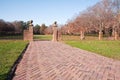 Brick walkway to a garden in autumn Royalty Free Stock Photo