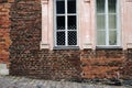 Brick wall and american flag in the window Royalty Free Stock Photo