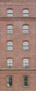 Brick wall with arch windows Royalty Free Stock Photo