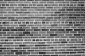 Brick wall as a rough textured and patterned abstract background Royalty Free Stock Photo