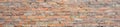 Brick wall as a rough textured and patterned abstract background Royalty Free Stock Photo