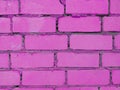 Brick wall. Background. Abstraction. Construction. The brick wall is purple.