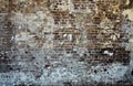 Brick wall background, industrial urban vintage warehouse covered in concrete plaster paint Royalty Free Stock Photo