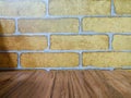 Brick wall background with wooden floor...