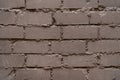 Brick wall beige-gray dark color texture rough grunge background Royalty Free Stock Photo