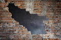 Brick Wall with Big Hole Gab Royalty Free Stock Photo