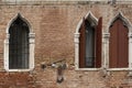 Brick wall characteristic of the houses of Venice, Italy. Royalty Free Stock Photo