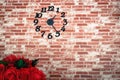 Brick wall with clock in cafe, background and copy space Royalty Free Stock Photo