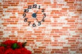 Brick wall with clock in cafe, background and copy space Royalty Free Stock Photo