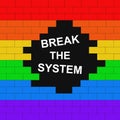 Brick wall colored in lgbt flag with text break the system.