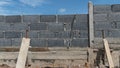 Brick wall construction. Wooden partition for the base. Royalty Free Stock Photo