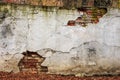 Brick wall cracked plaster Royalty Free Stock Photo