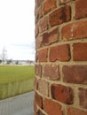 Brick wall curved with park, foot path and distant Hudson river Royalty Free Stock Photo