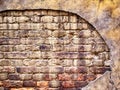 Brick wall with damaged plaster, old background texture Royalty Free Stock Photo