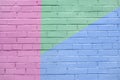 Brick wall decorated with of colorful colors. Geometric detail of a graffiti. Abstract bright background Royalty Free Stock Photo