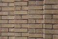 Brick wall four columns staggered beige with dark grout