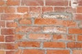 Brick wall with a fragment of the mortgaged window.