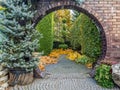 Brick wall gate in the garden Royalty Free Stock Photo