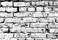 Brick wall grunge background with dotwork style. Grungy block pattern with dotted texture.