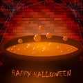 Brick wall and Halloween cauldron