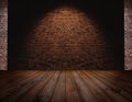 Brick wall and Hardwood floor, light spot on center for background Royalty Free Stock Photo