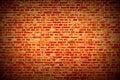 Brick wall horizontal background with red, orange and brown bricks - dark red Royalty Free Stock Photo