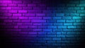 Brick wall illuminated by violet and blue lights providing an abstract pattern Royalty Free Stock Photo