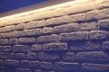 Brick wall indigo lighting