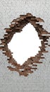 Brick Wall with Large Circular Hole in White Masonry Royalty Free Stock Photo