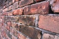 Brick wall made of very old red bricks from up close Royalty Free Stock Photo