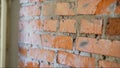 Brick ready to build house wall in a construction site. Brick wall, masonry, ready for repair. Royalty Free Stock Photo