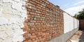 Brick Wall with Mixed Plaster Royalty Free Stock Photo